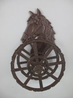 držák na zahradní hadici